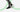 Model trägt Barfußschuhe Highrise Knit der Marke Feelgrounds in der Farbe Black & White und graue Skinny Jeans